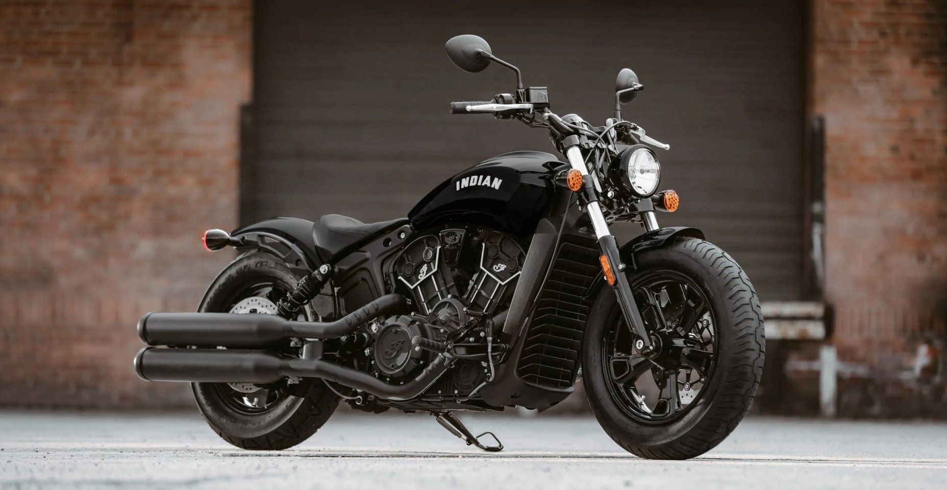 Indian Scout 60 displayed in front of garage door