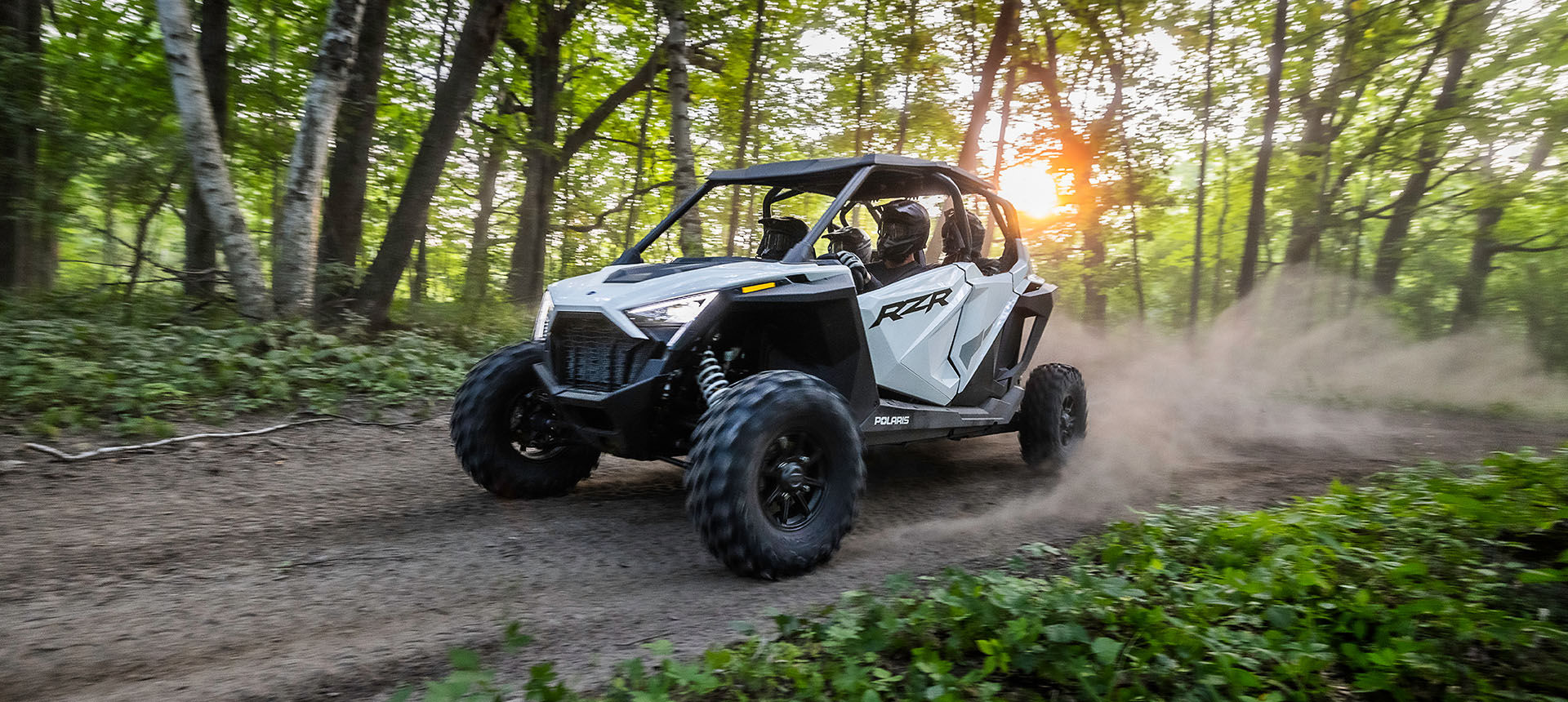 Off-road Polaris RZR Pro parked on dirt trail