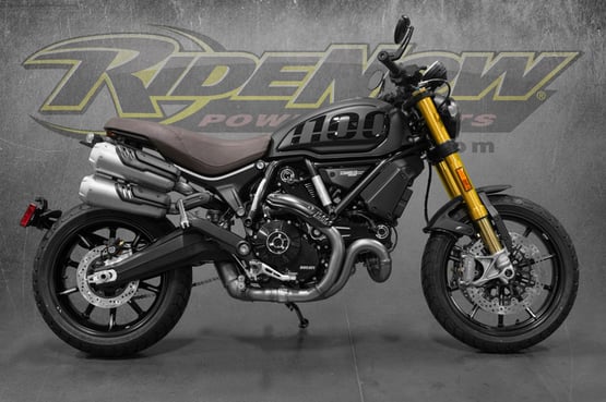 Black Ducati Scrambler 1100 Sport Bike - Sleek and Powerful Riding Experience