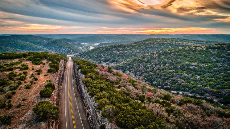 The Twisted Sisters Motorcycle Route leads travelers down a long stretch of curving roads in the Texas Hill Country.