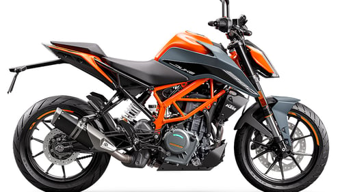 KTM Duke 390 with black and orange fairings is the newest Duke in KTM's 2023 lineup. 