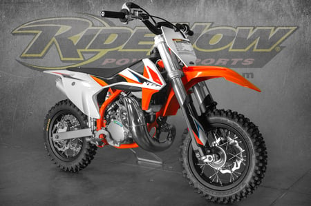 Orange and White KTM 50 SX Mini Kids Dirt Bike, an Exciting Ride for Young Off-Road Enthusiasts