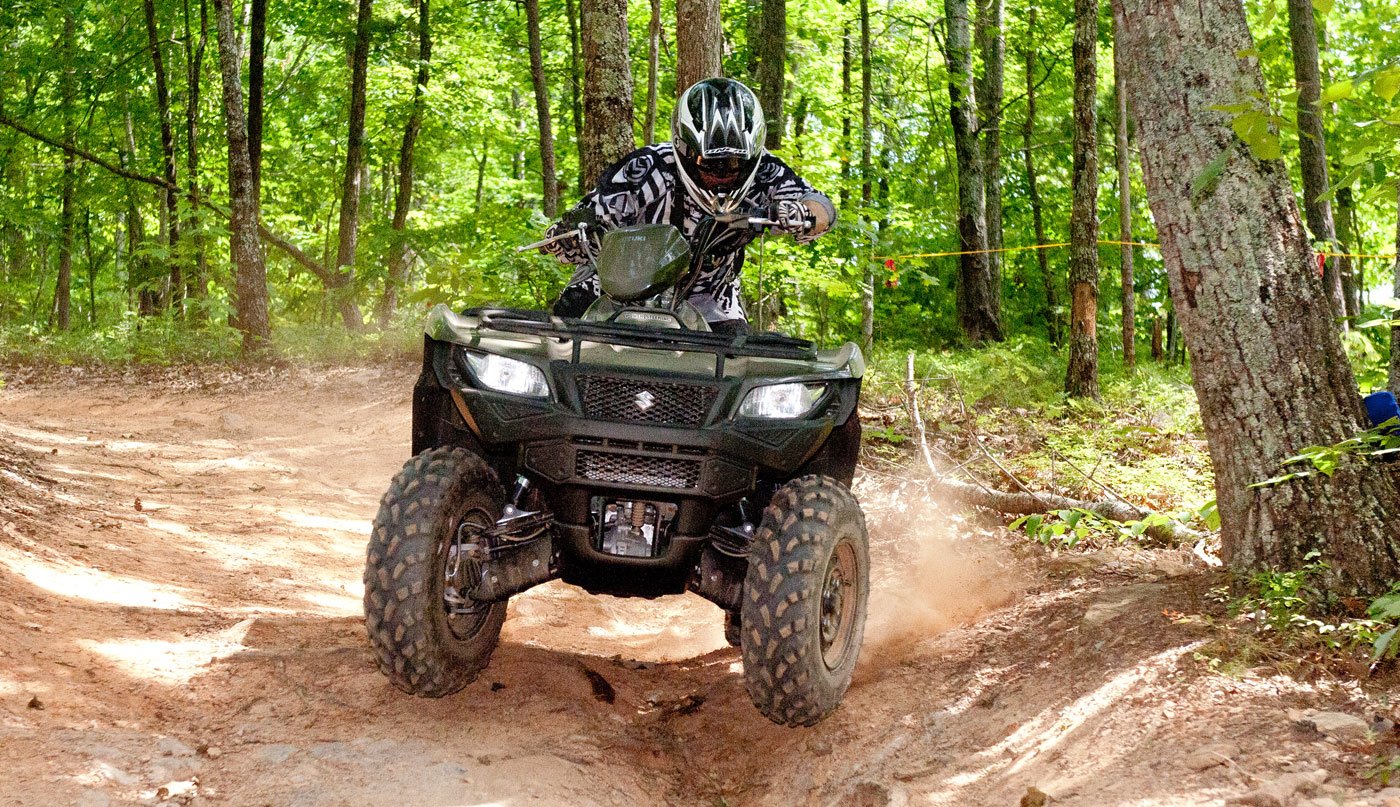 Best ATV: Suzuki King Quad on dirt trail - Experience the thrill of off-roading 