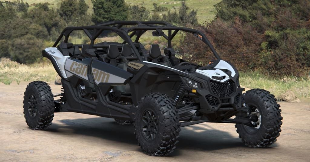 Can-Am Maverick X3 is one of the best UTV side-by-sides of 2023, and is shown here parked on an off-road dirt path. 