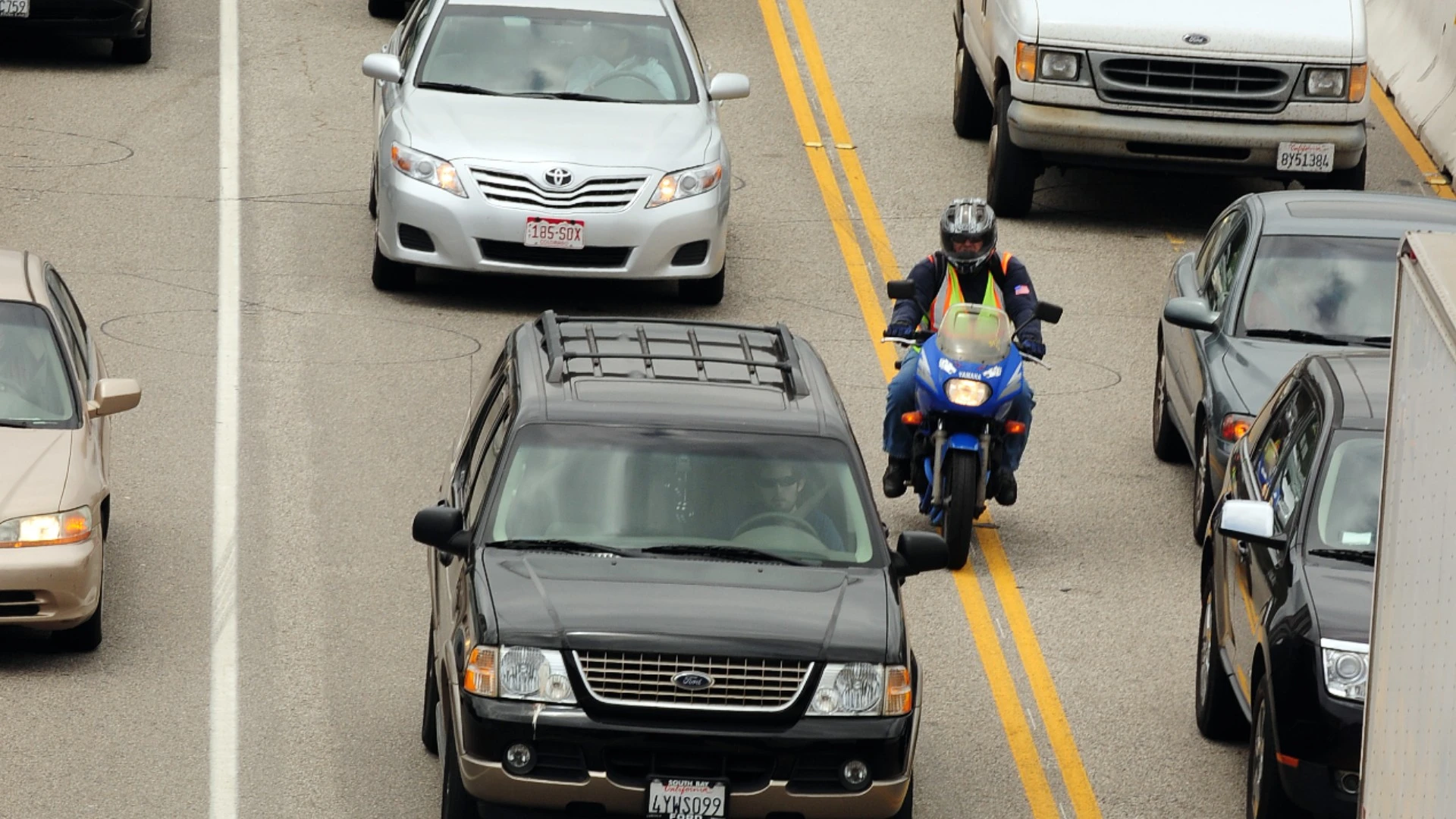 Motorcyclist lane splitting - efficient and legal way to beat traffic