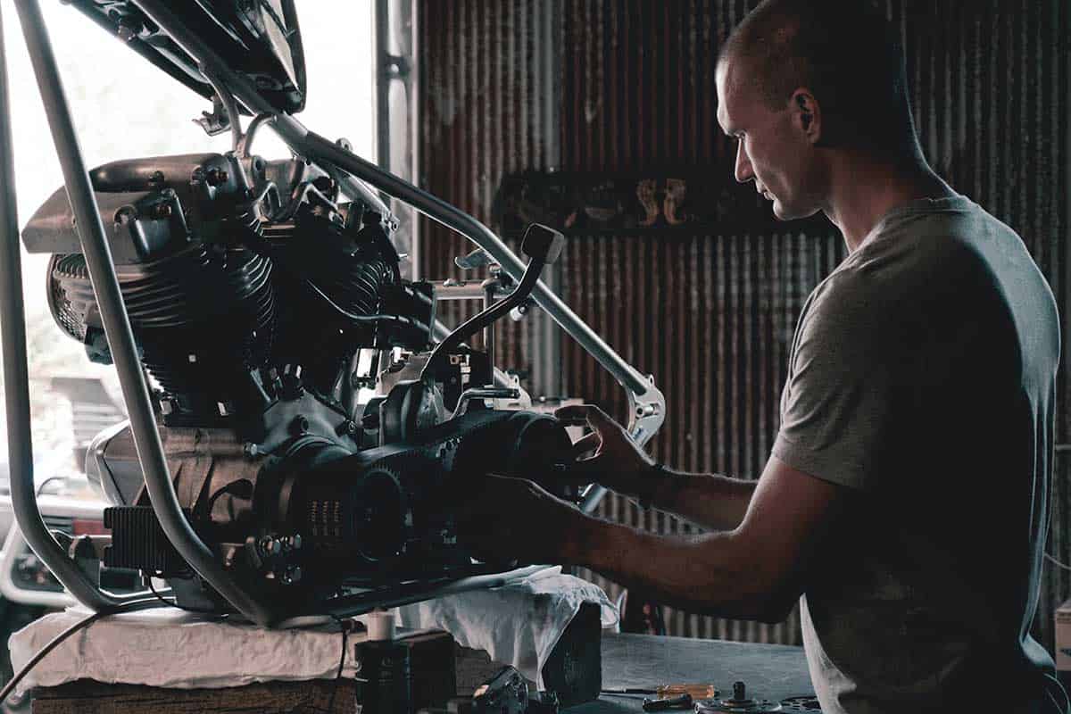Skilled mechanic meticulously builds motorcycle piece by piece